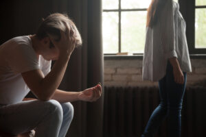 wife or girlfriend leaving depressed heartbroken husband