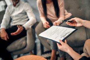 couple signing divorce agreement